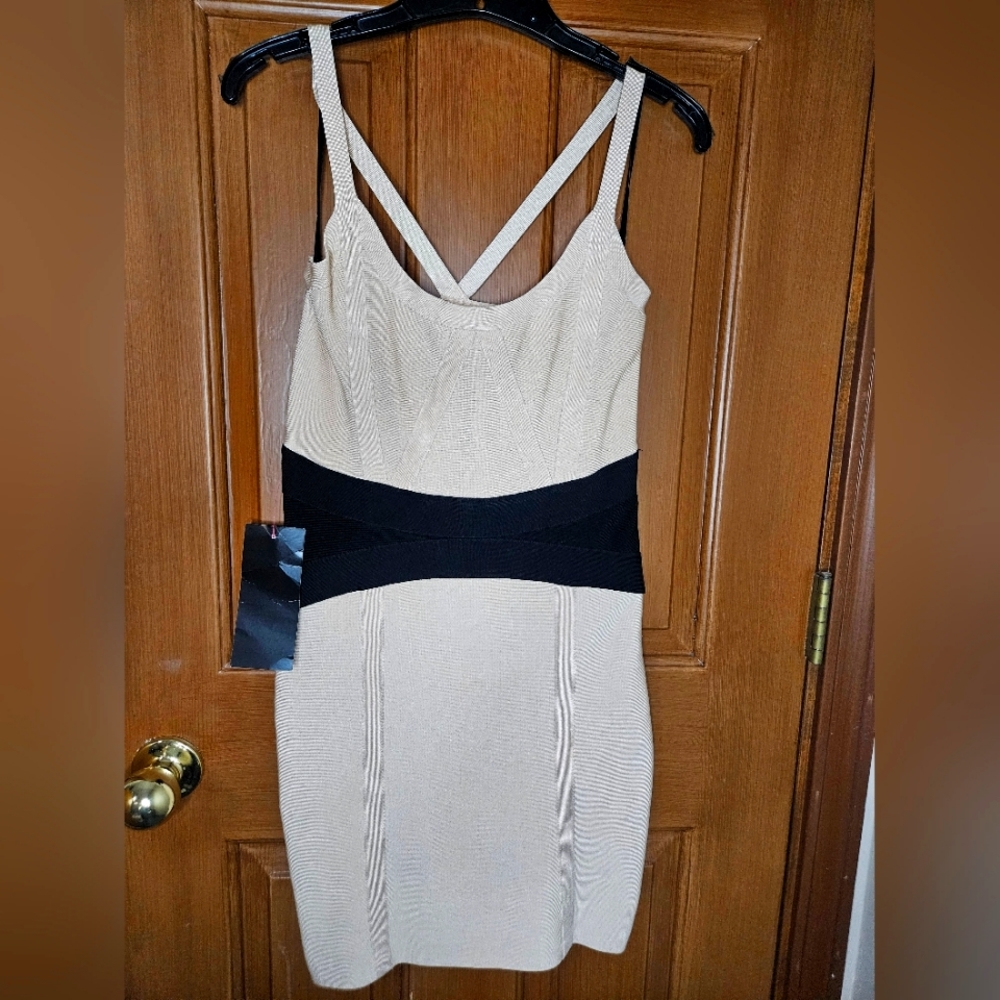 Bebe Spanx body dress women. Size M. Champagne color with black stripe